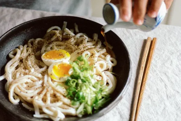 Life Changing Udon with Soft Boiled Egg, Hot Soy, and Black Pepper